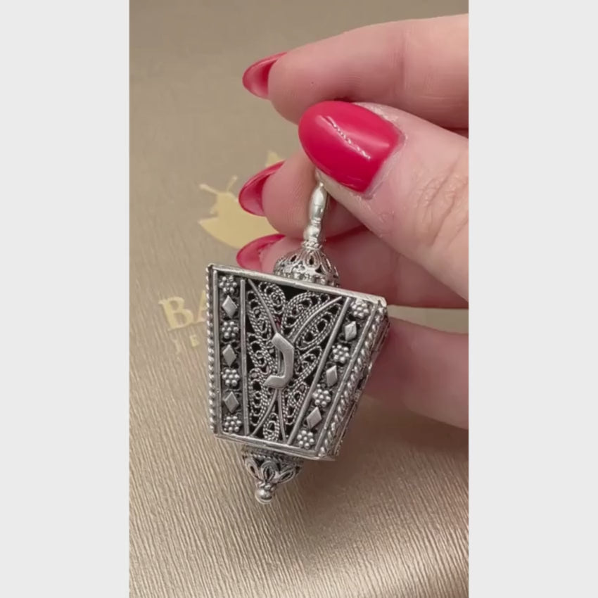 Load video: Sterling Silver Cube Filigree Dreidel