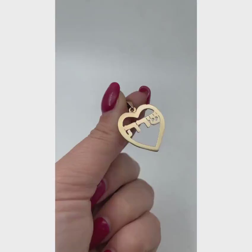 Load video: 14k Gold Heart Cutout Hebrew Name Pendant