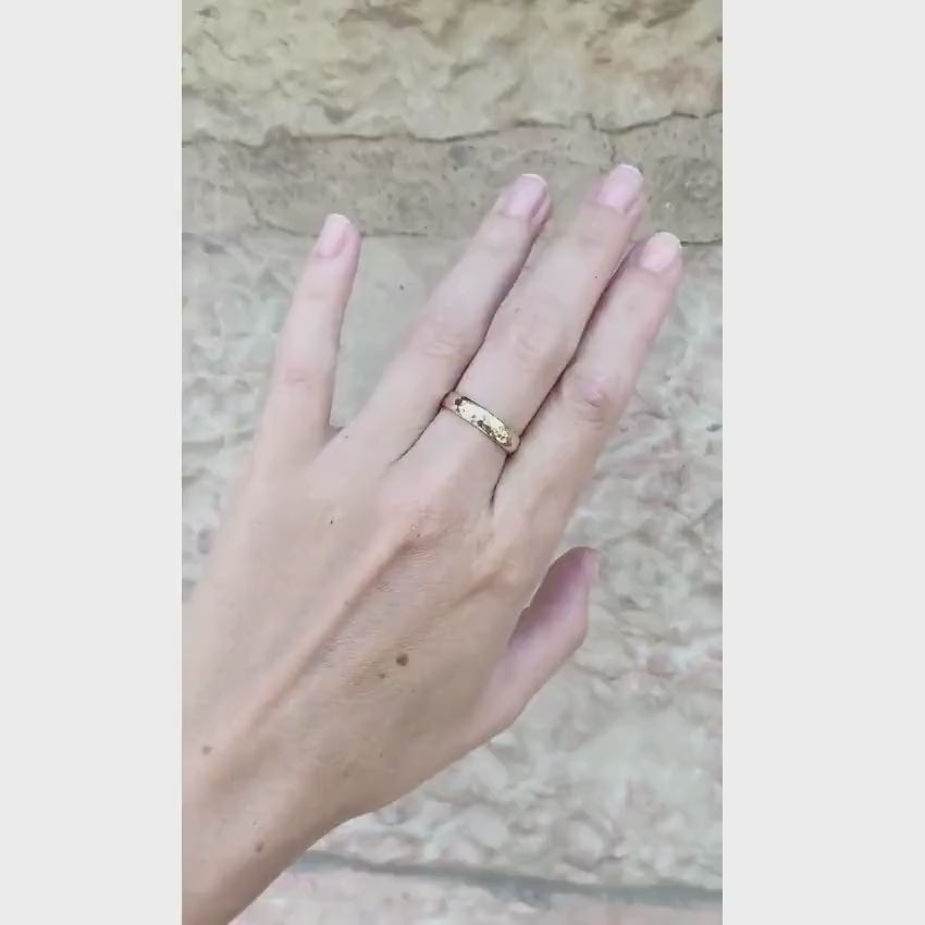 Load video: Hammered 14K Gold Wedding Band Laser Engraved