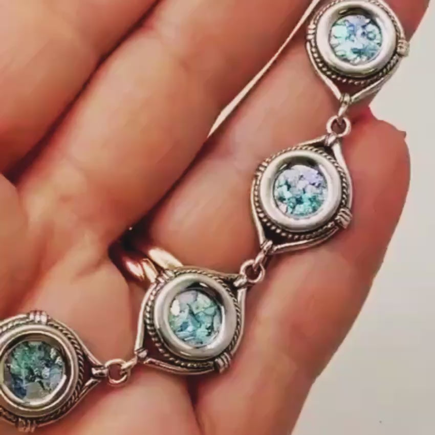 Load video: Sterling Silver Roman Glass Link Bracelet Round Station