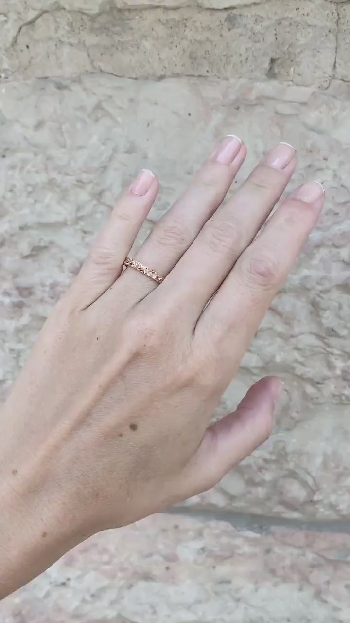 Load video: 14k Rose Gold Faceted Narrow Wedding Band