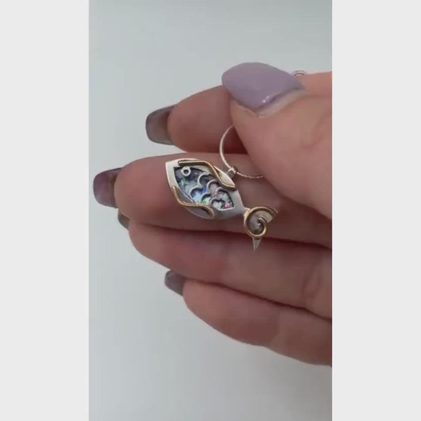 Load video: Fish Pendant in Sterling Silver Roman Glass
