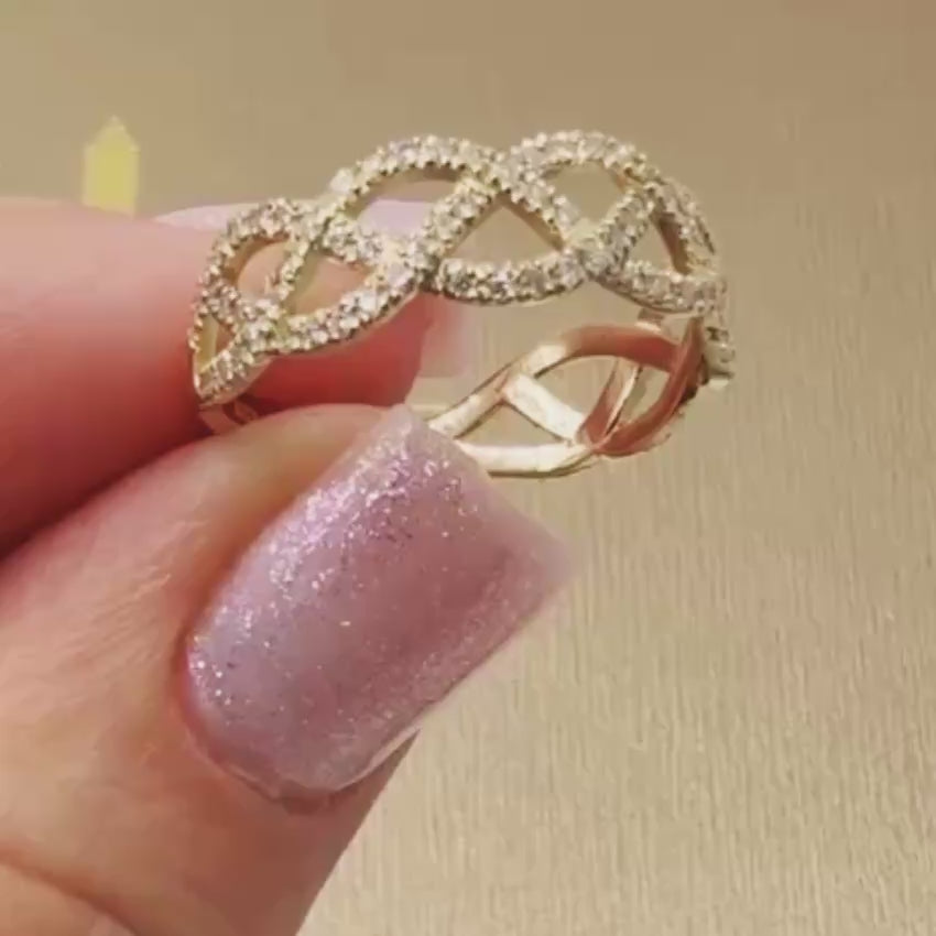 Load video: 14K Gold Natural Diamond Infinity Weave Ring