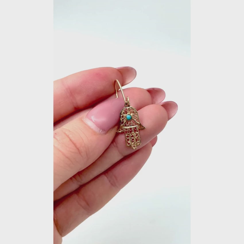 Load video: 14k Gold Hamsa Earrings with Turquoise