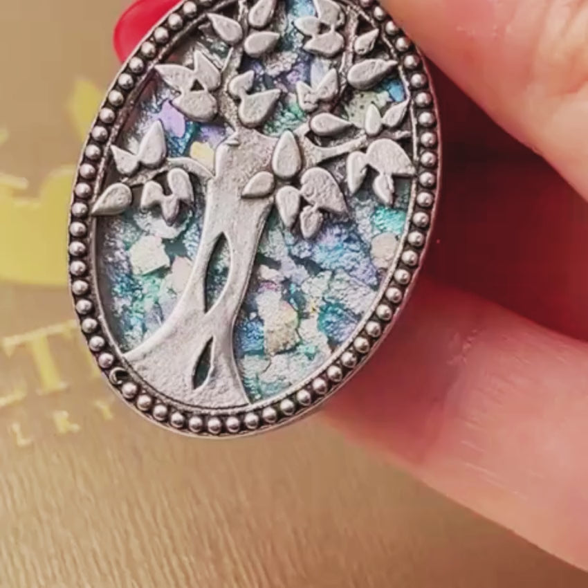 Load video: Tree of Life Necklace with Roman Glass in Sterling Silver Oval