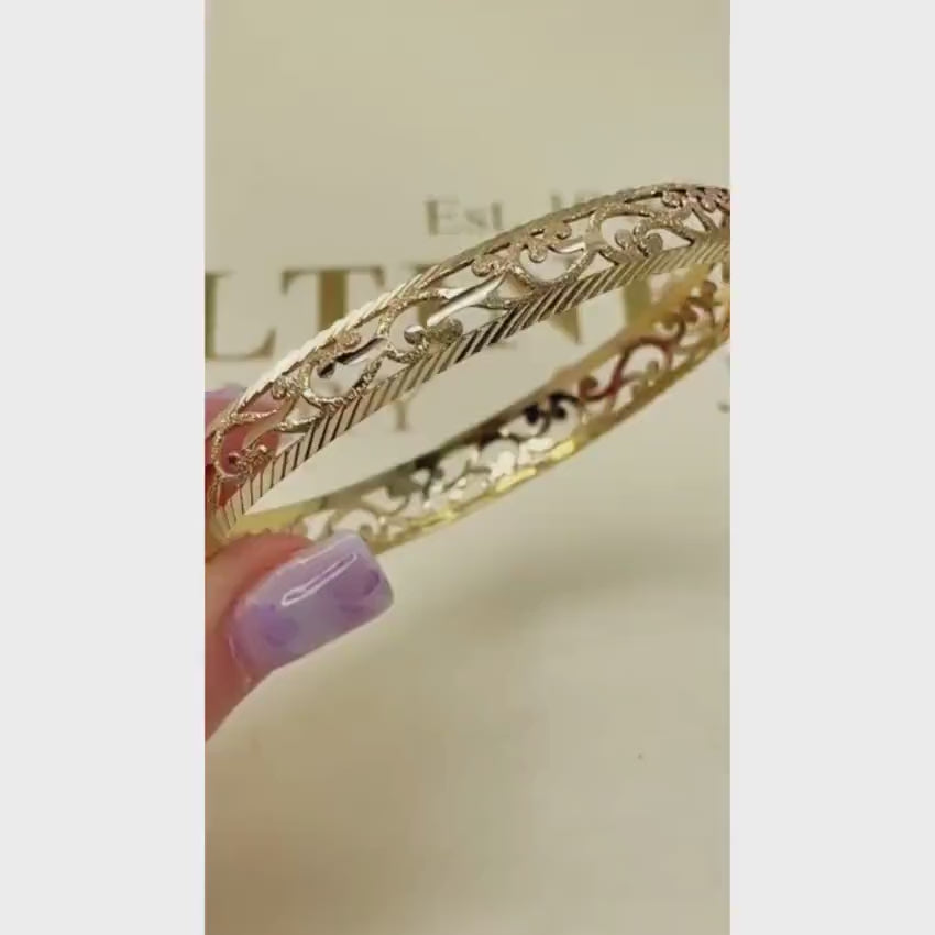 Load video: Modern Filigree Bangle with Laser Cut Edging in 14K Gold