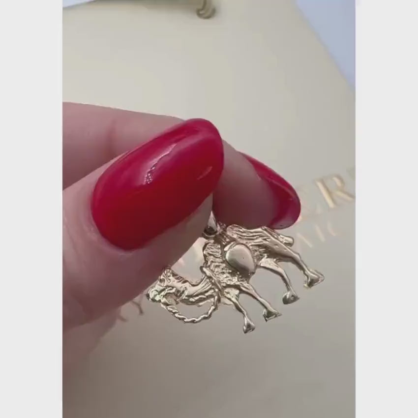 Load video: Camel Pendant in 14k Gold