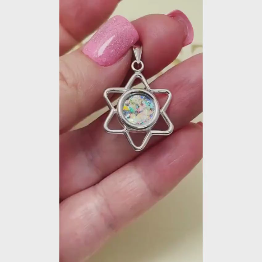 Load video: Sterling Silver Roman Glass Cutout Star of David Pendant