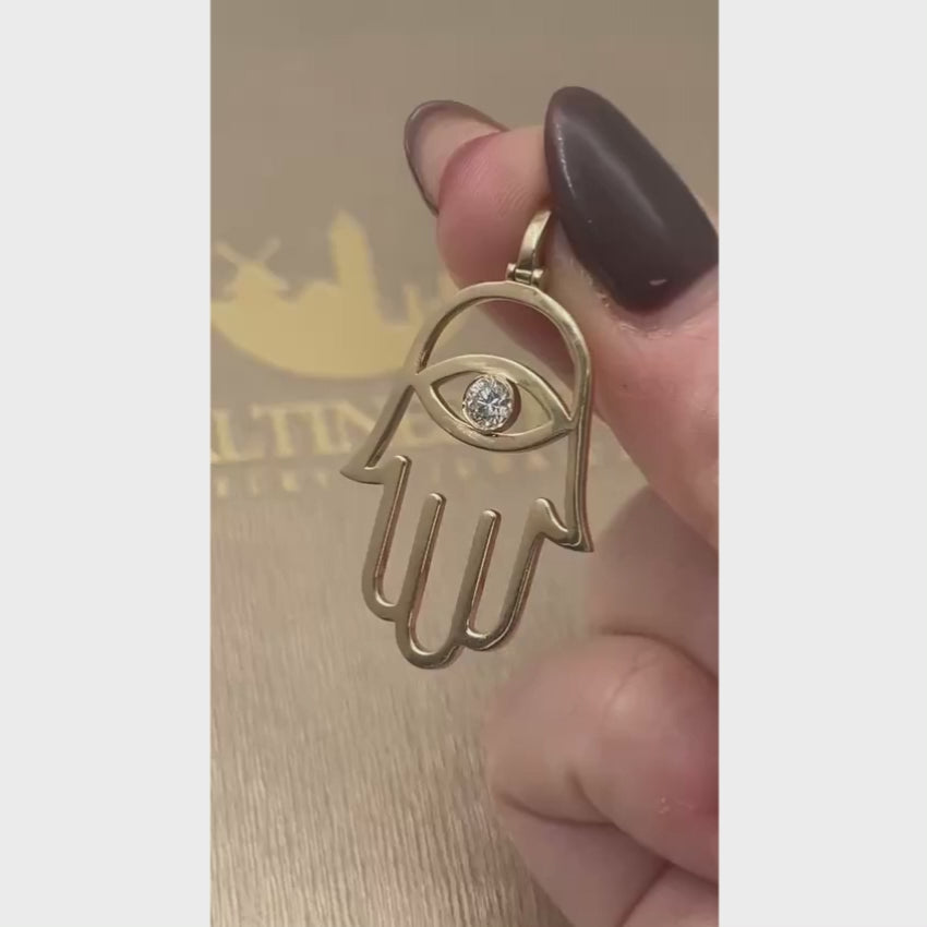 Load video: Diamond Hamsa Evil Eye Pendant in 14K &amp; 18K Gold Options